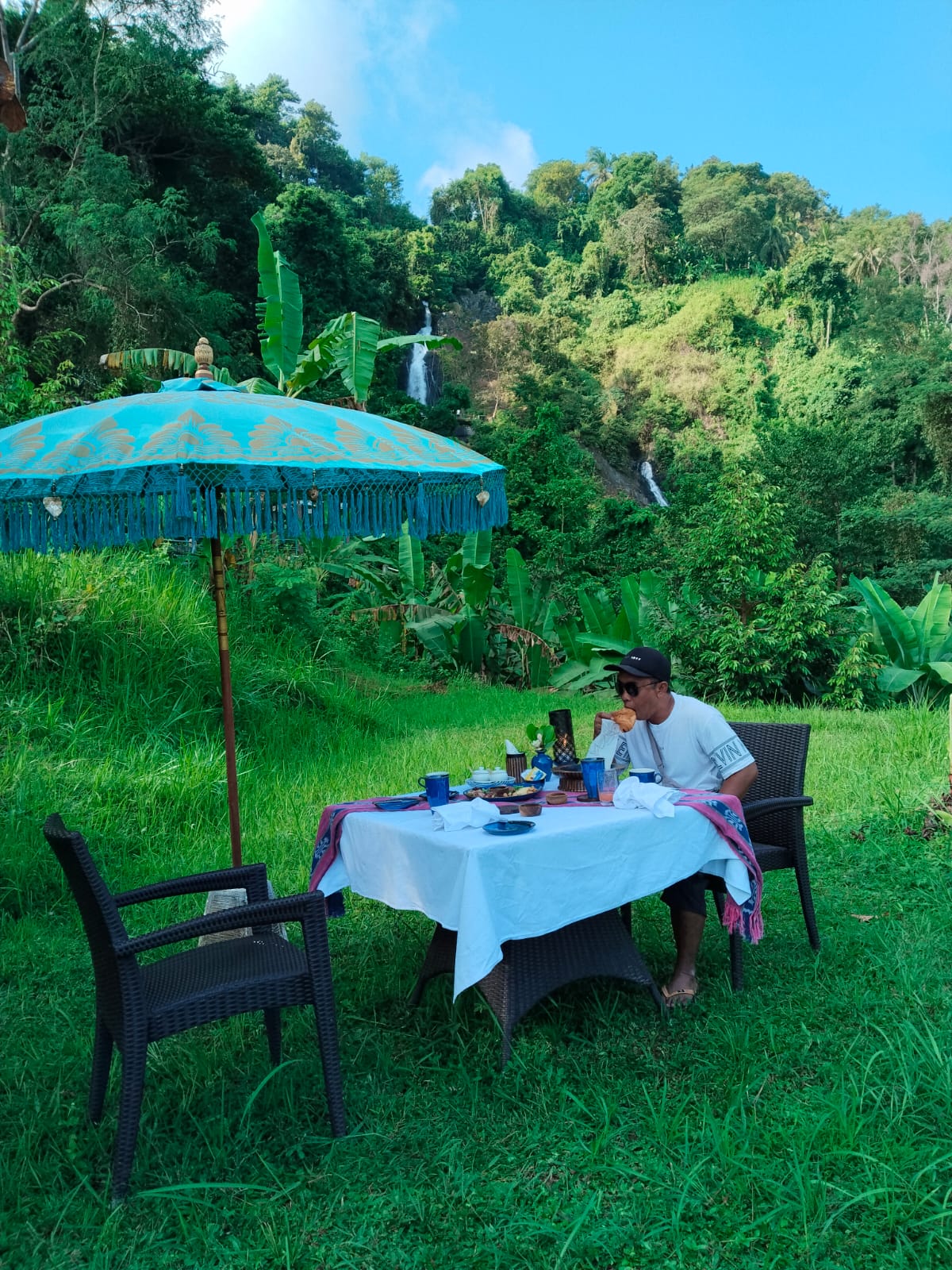 Dining under the waterfall 1